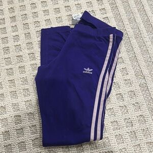 Adidas Purple Sweatpants with Iconic Stripes